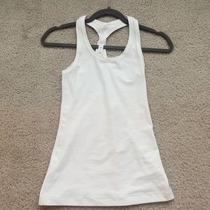 White Lululemon Cool racerback Tank. Size 2 no rips or tears. Good condition